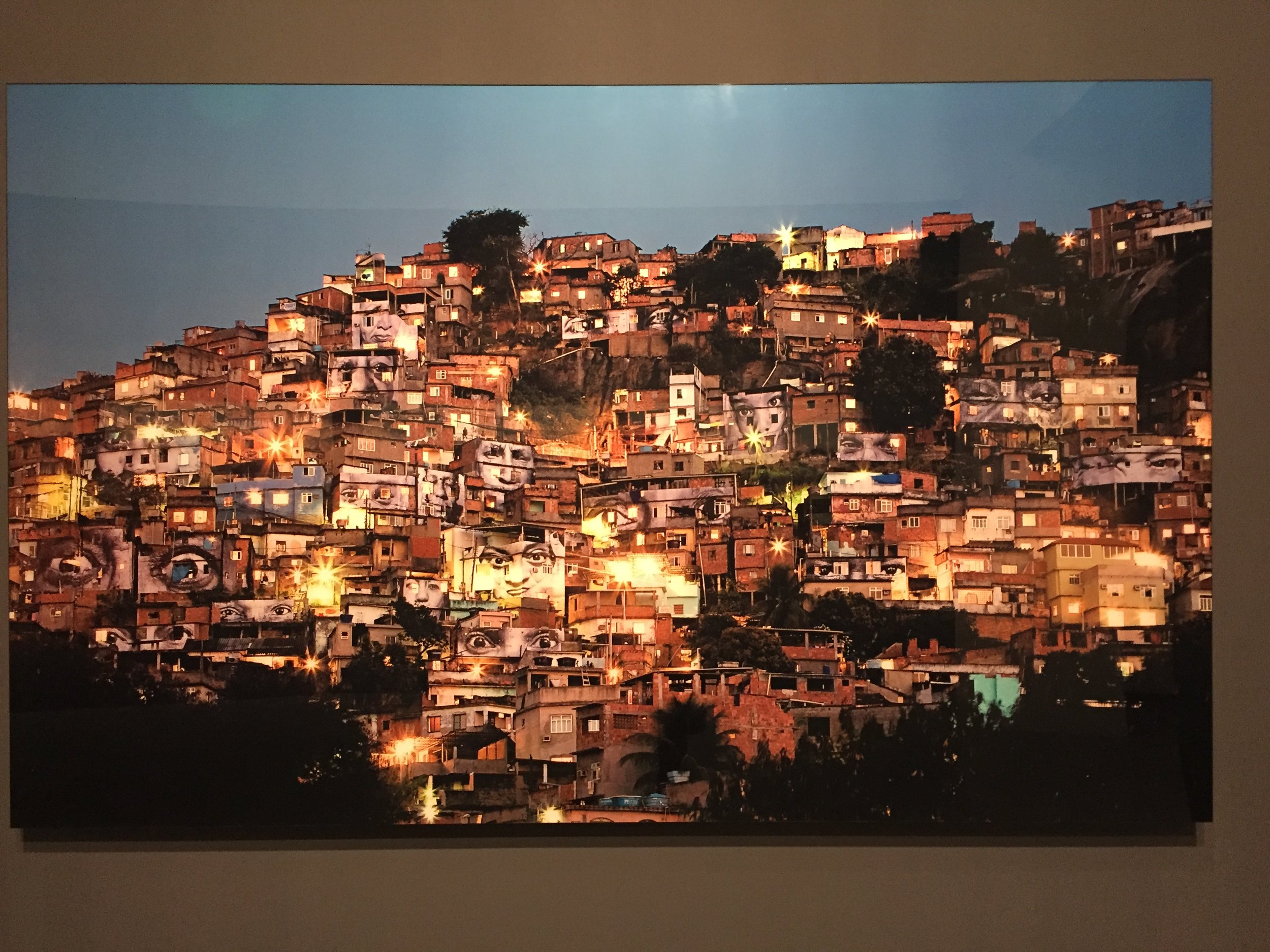 The favelas of Rio, painted with faces by French street artist JR - part of an exhibition of his urban "no frames" art.