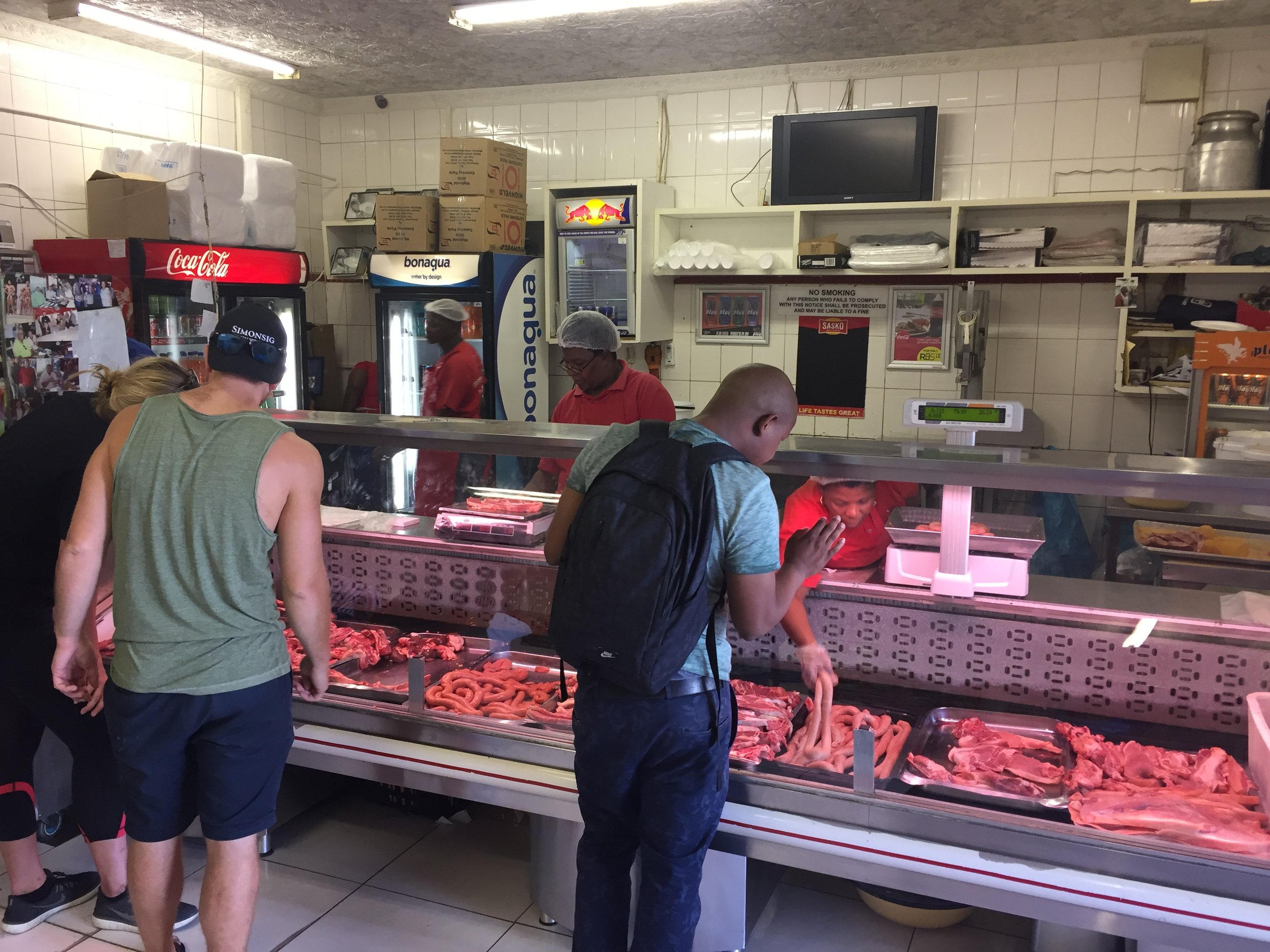 Lunch as Mzoli's, a butcher in the Gugulethu township north of Cape Town.