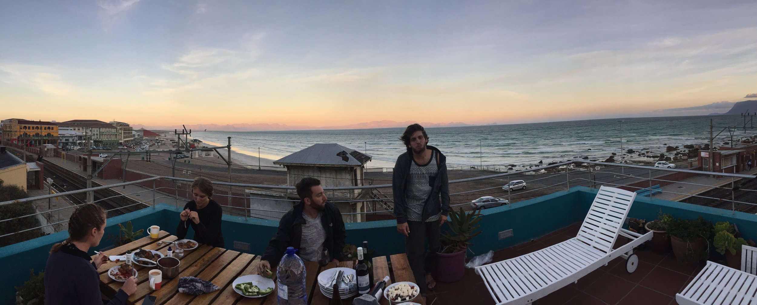 Chef Niko strikes again - making dinner for our hostel on the Stoked Backpackers rooftop in Muizenberg.