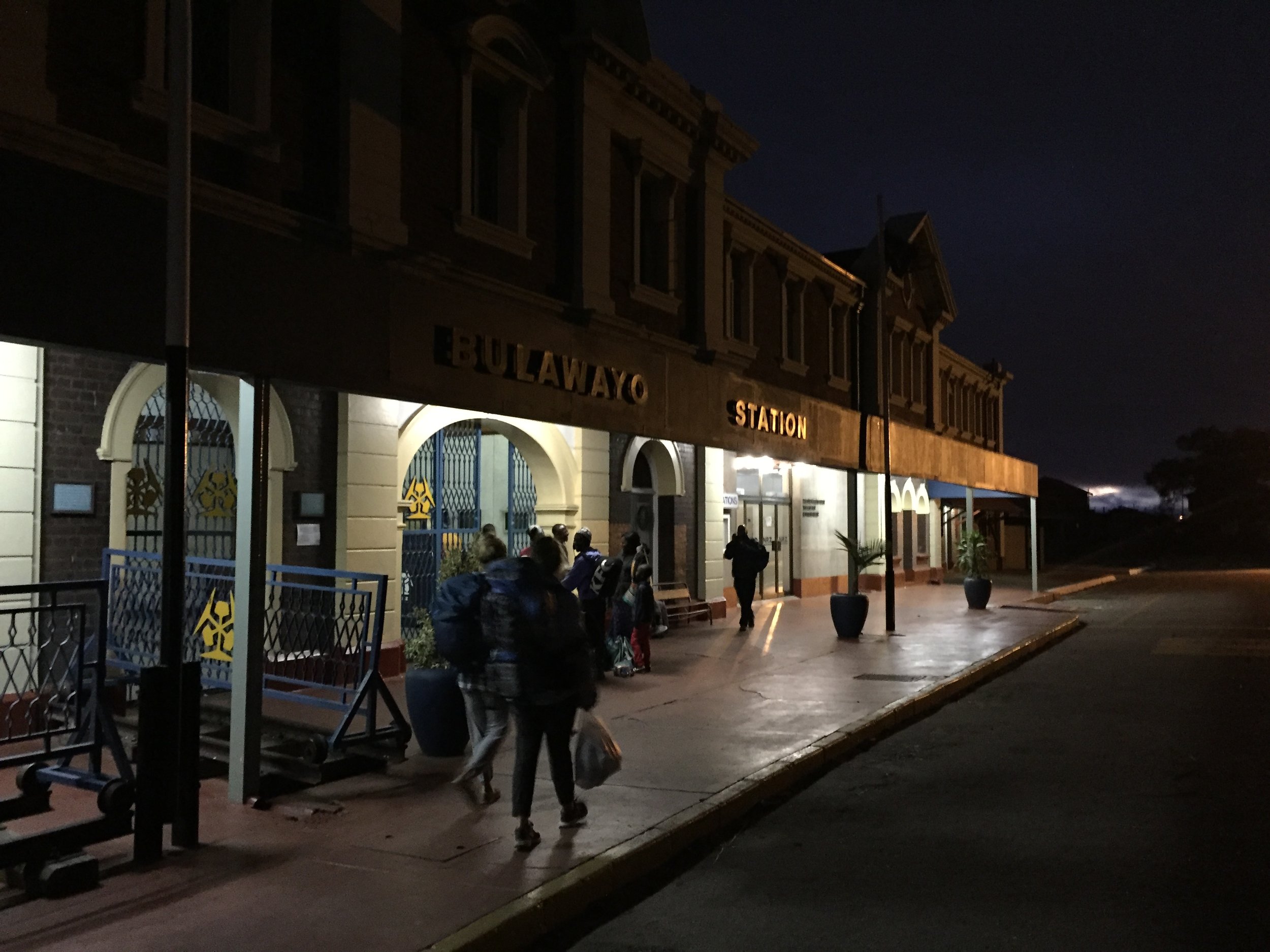 Passengers arriving at the station for the overnight northbound train from Bulawayo.