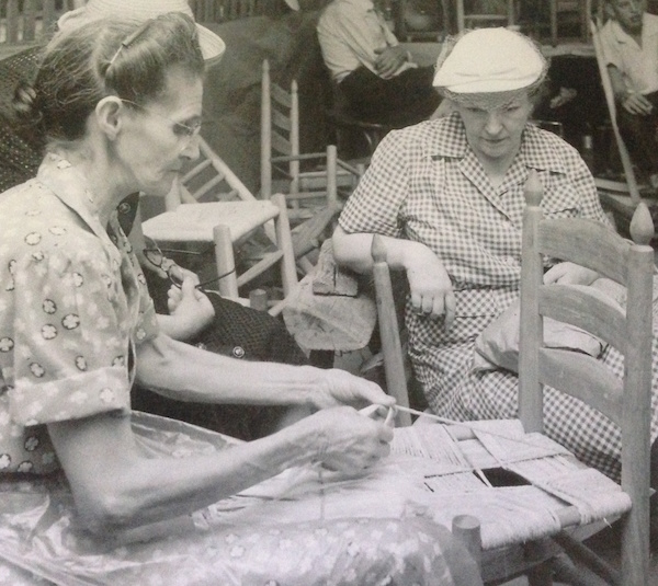 Sara Mace demonstrating making chair seats out of corn husks at the Craftsman's Fair