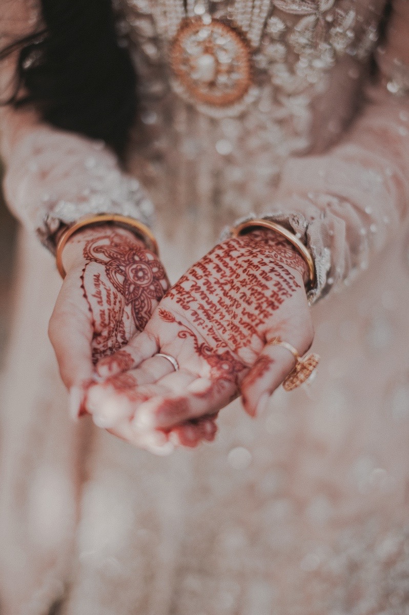 You can customize your bridal mehndi. This bride asked me to incorporate the love letters from her groom into her henna.