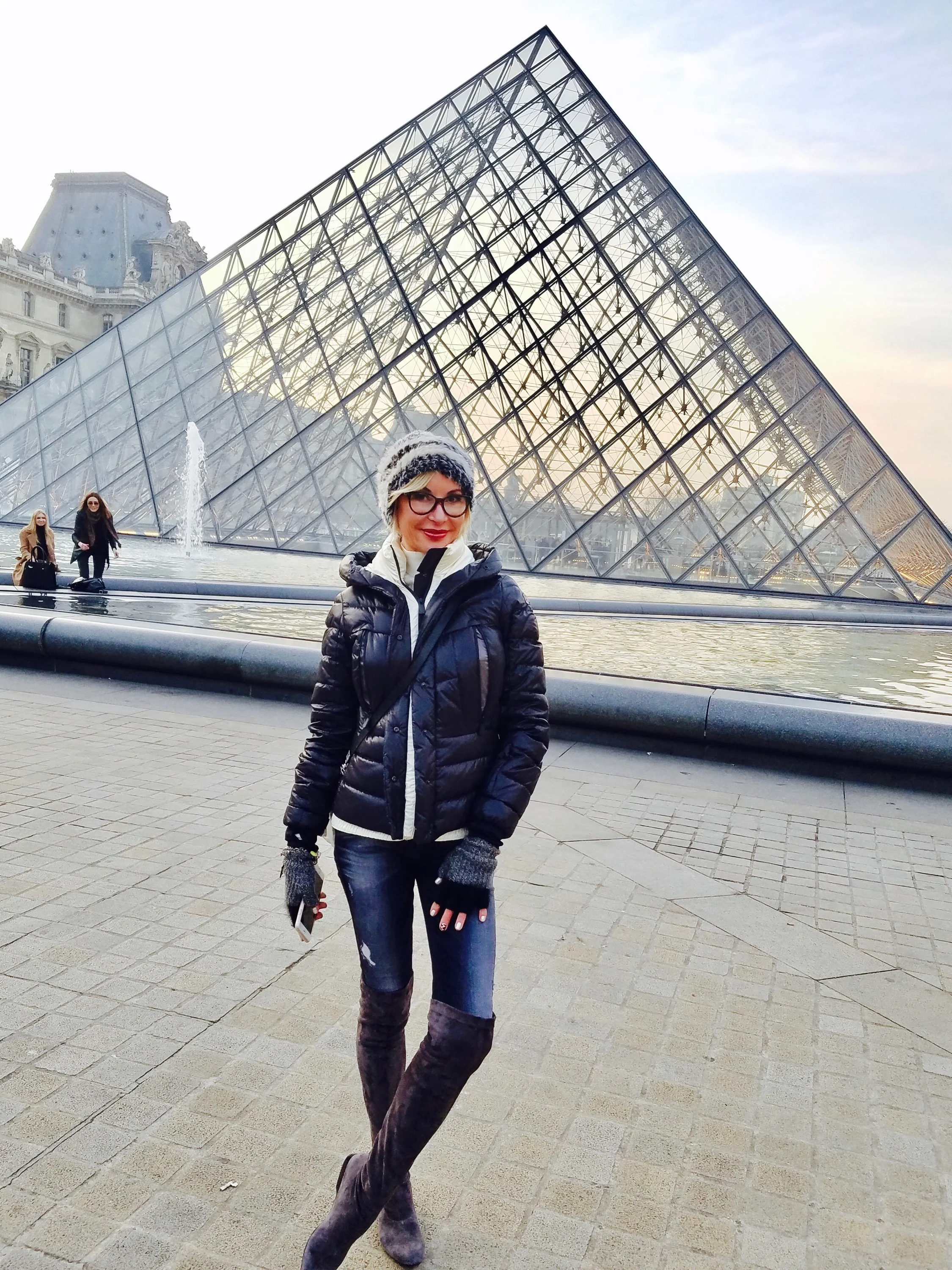 All bundled up in front of the PEI PYRAMIDE in the Louvres (outside)