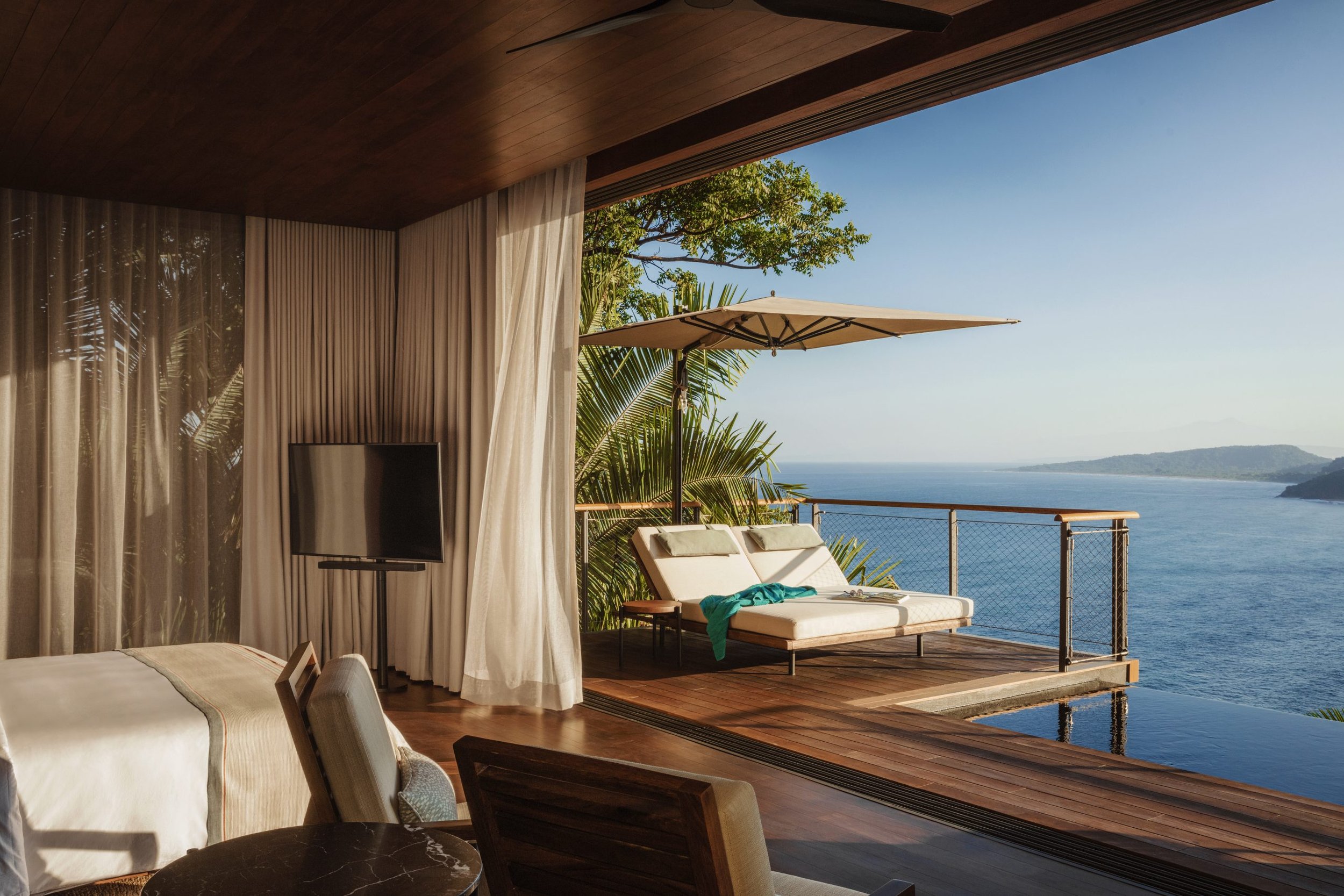 OneOnly_Mandarina_Accommodation_Panoramic_Ocean_Treehouse_Seating_Sunbeds_View_1930_MASTER-scaled.jpg
