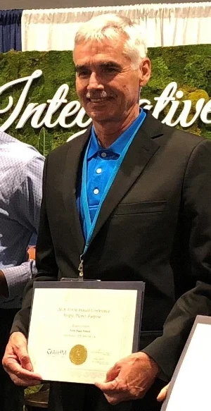 Dr. John Burns awarded first place of the AIHM 2018 posters. photo credit Megan Gale