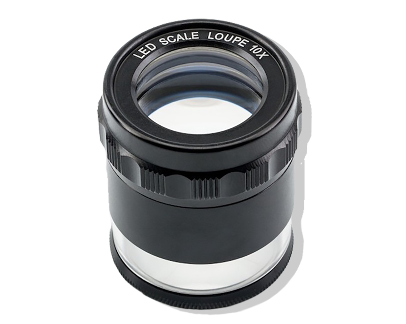 Maybe you’re familiar with this one, maybe not. An eye loupe is a magnification tool that does not have a handle. This comes in handy when you need both hands to closely examine a small object. Some loupes have marked measurements on the lens and can be used by our graphic designers when trying to determine an unknown line weight off screen.