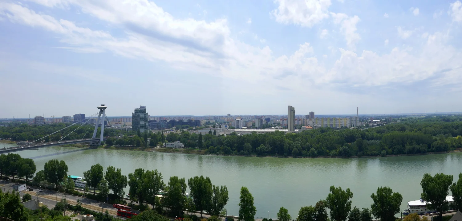 Panorama of Danube River, Bridge of the Slovak National Uprising, and UFO Observation Deck from Parliament Restaurant, Bratislava, Slovakia