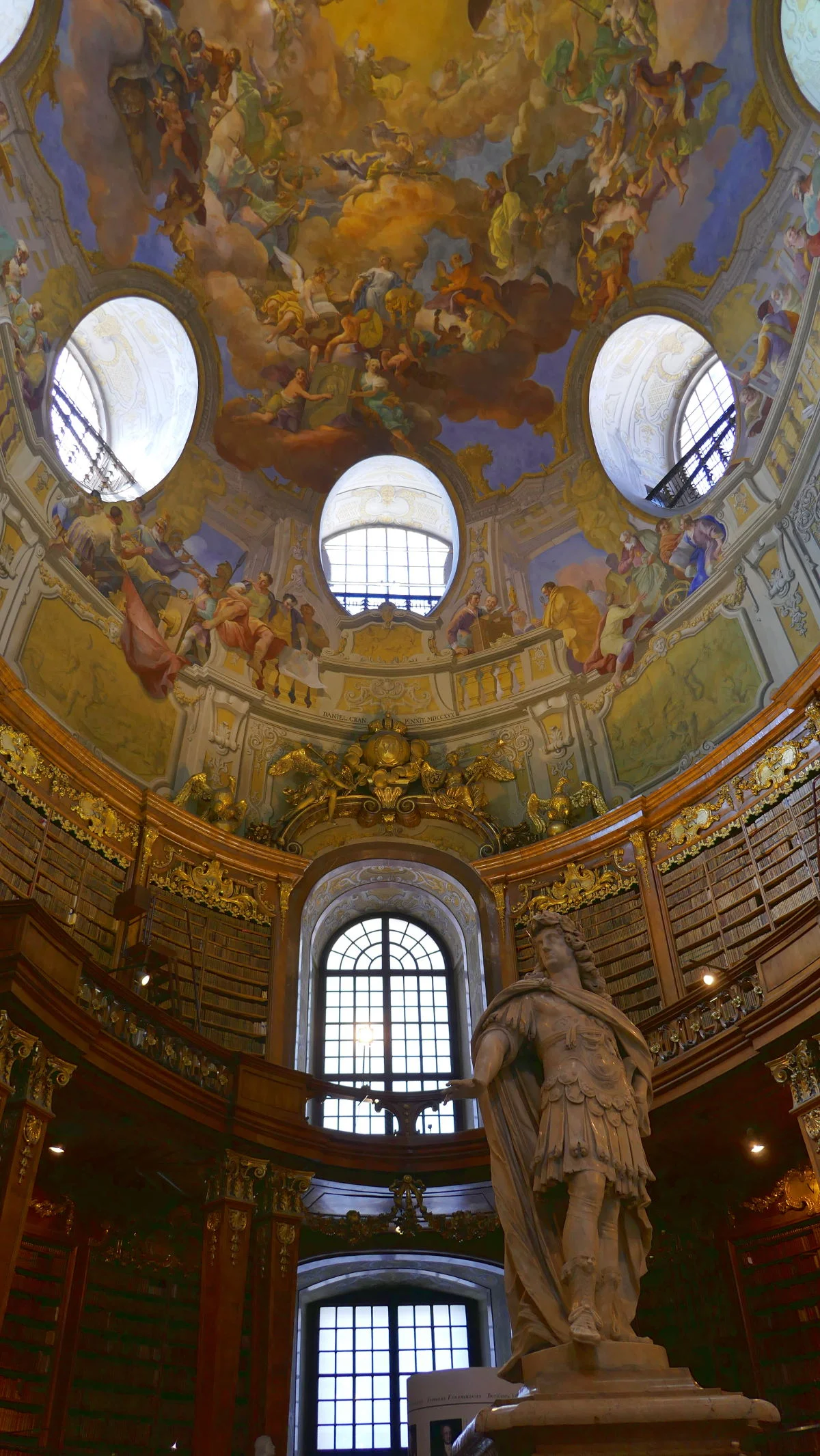 Emperor Karl VI Sculpture by Johann Bernhard Fischer von Erlach and Ceiling, Austrian National Library Interior (Prunksaal), Vienna, Austria