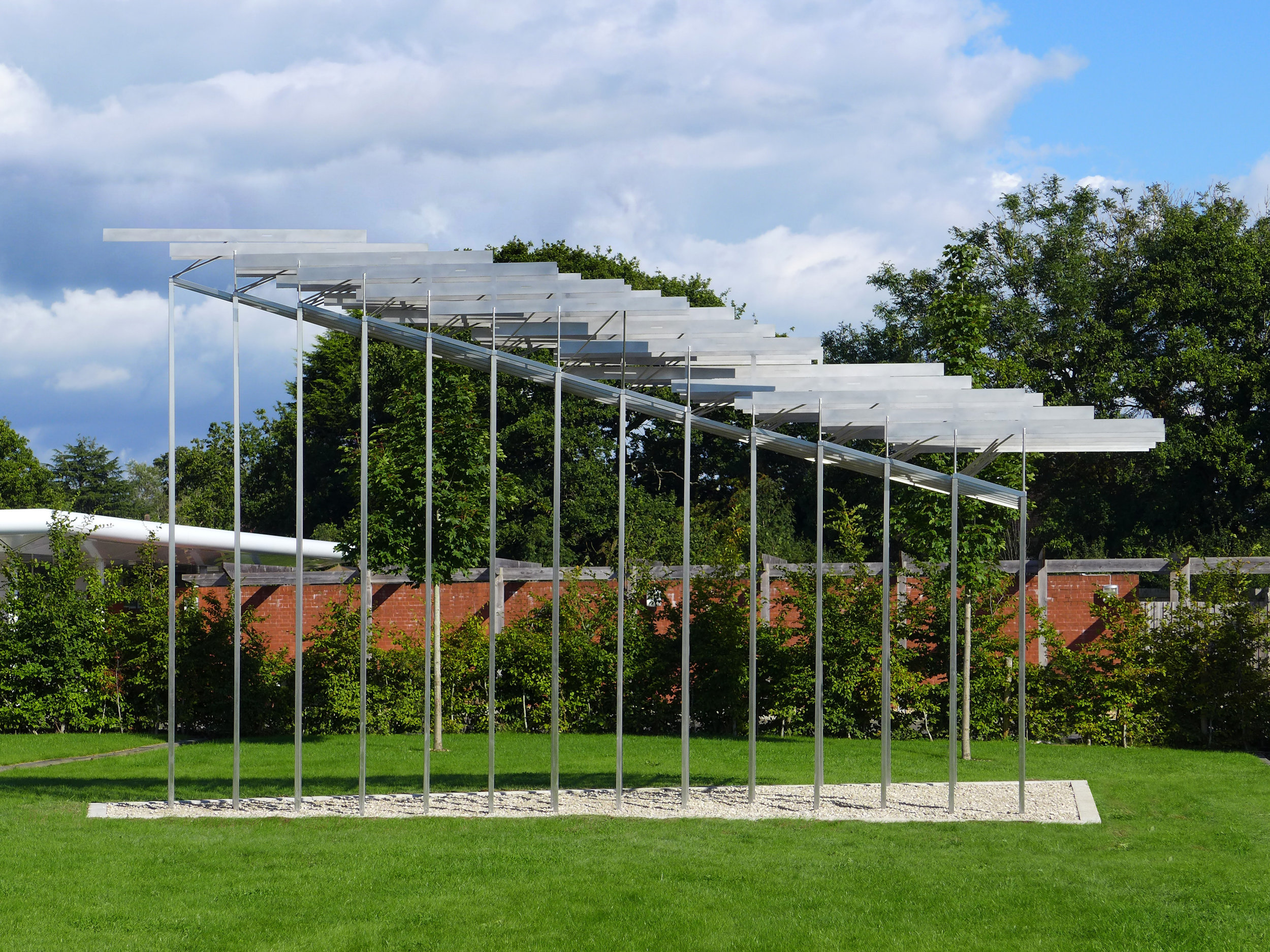 The pavilion-esque form is inspired by the perpetual endeavour involved in the process of ‘capturing change’. In the world of cartography, much of this endeavour can be distilled down to two concurrent activities - observing gradual alterations in the natural landscape, and mapping more rapid and frequent human interventions.