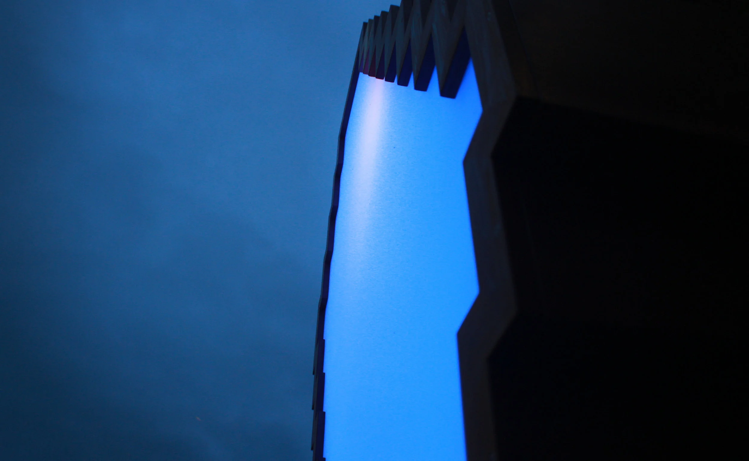 Passers-by can interact with the sculpture via mobile phone text messaging to influence the colours of the lighting and communicate coded messages.