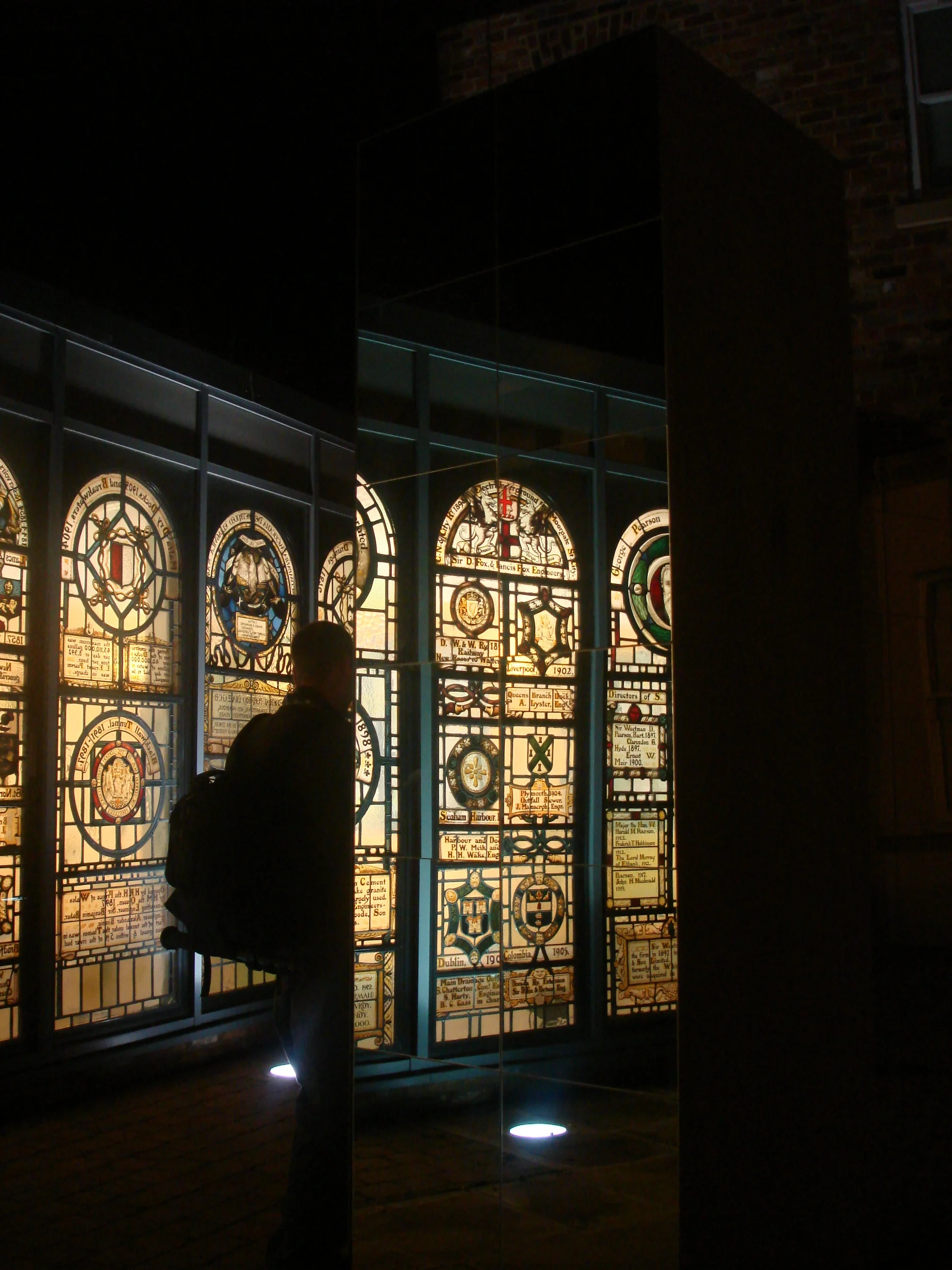  Ranks of mirrors were strategically placed in the courtyard of the School of the Built Environment, Leeds Metropolitan University during Light Night to reflect the illuminated stained glass panels. As visitors moved through the installation, views o
