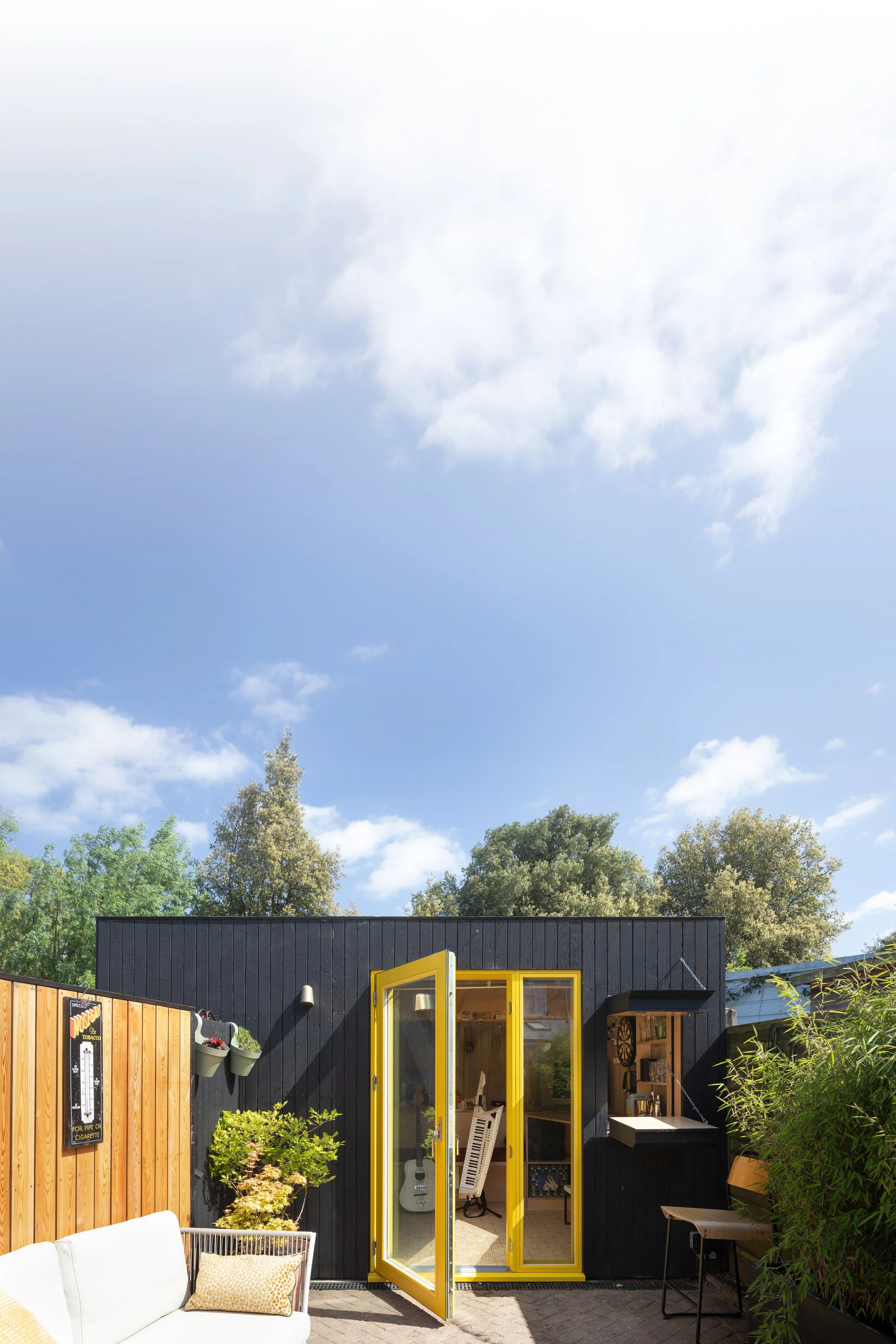  Located in Enfield, The Pickled Egg represents a radical "retrofit-first" approach to the neglected typology of the mid-century outbuilding. The project involved the transformation of a 1960s prefabricated concrete garage—originally destined for dem