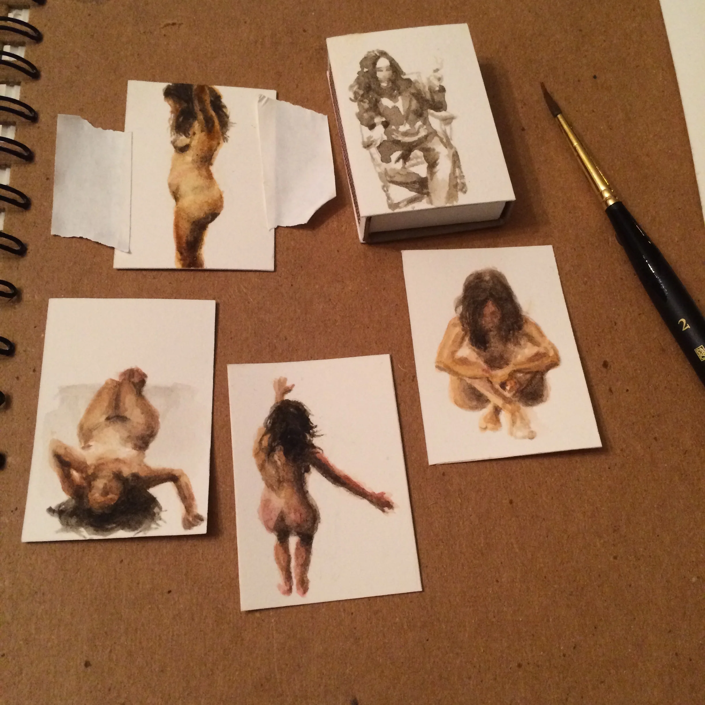  Miniatures from the "Falling" series, plus Frida smoking on a matchbox. 