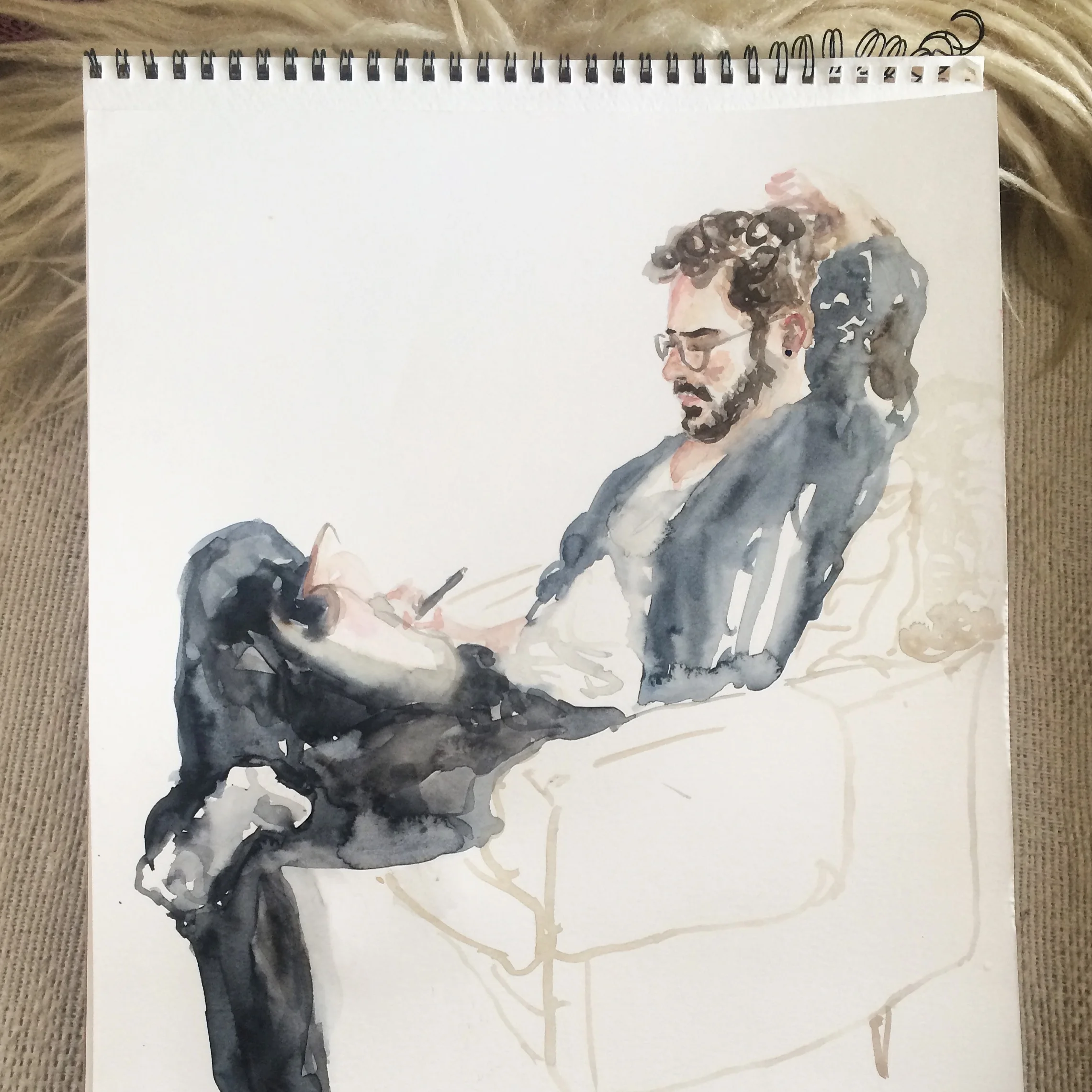  Joel, twirling his hair and grant writing. 