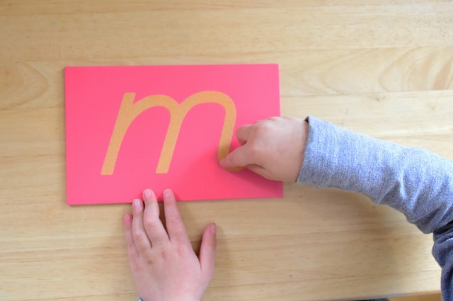  Tactile letters made of sandpaper can help students trace the letters as they say the sounds. (Photo by  Lisa Maruna .) 