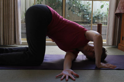 Parivritti Marjariasana