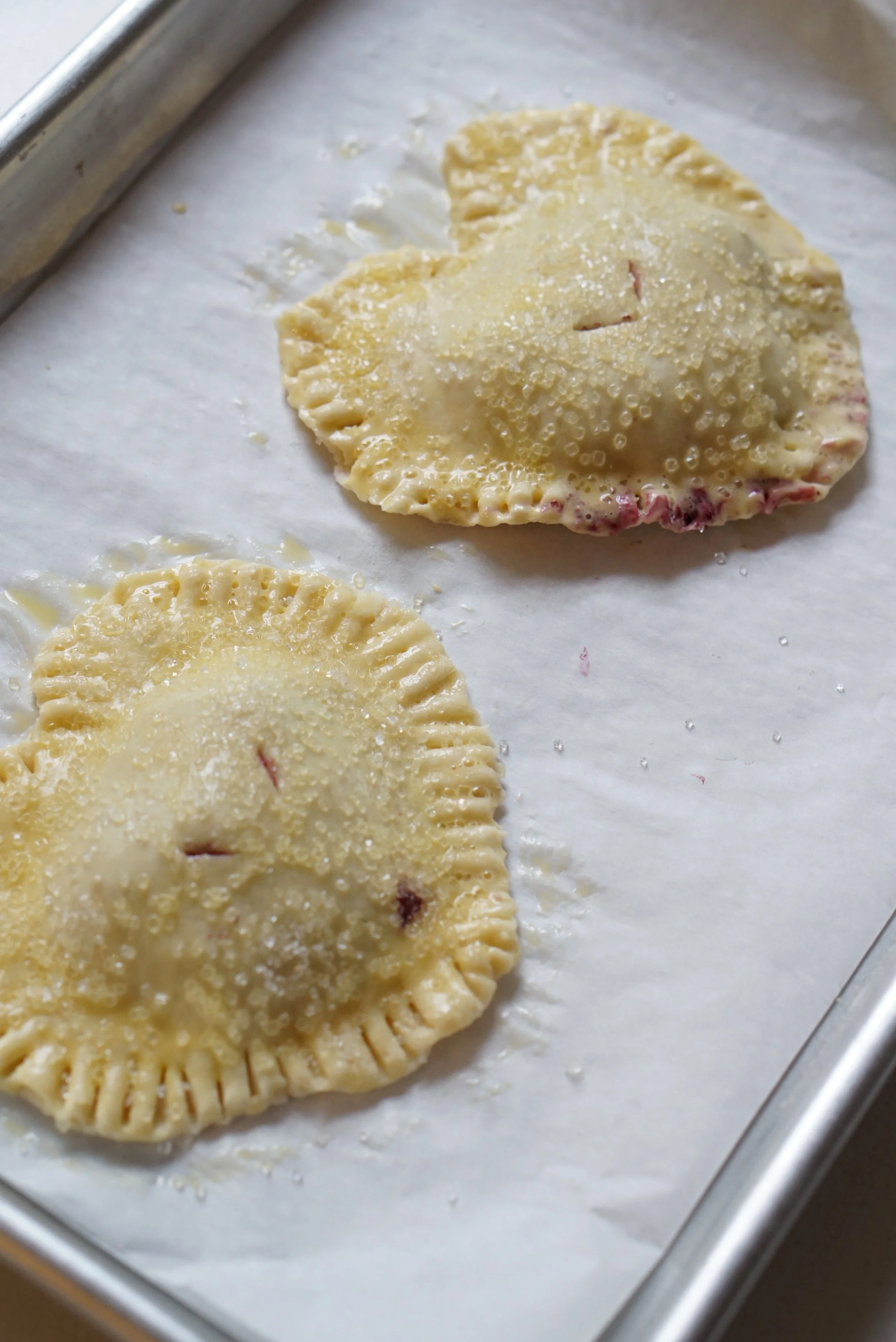 Brush with egg wash and add sanding sugar. Voila! Into the oven they go!! :D 