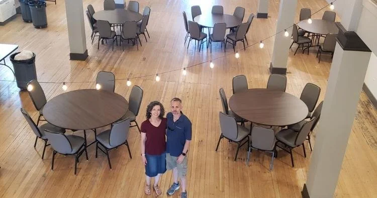 Craig and Mariya Yadon pose for a photo on the main floor of the Purpose Center in Historic Downtown Pocatello. Photo by Shelbie Harris/Idaho State Journal