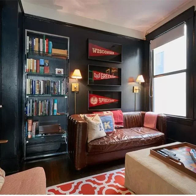 Little leather, little memorabilia, lots of #warriors fever in the den tonight! #benjaminmoore #airbnb #airbnbvacations #den #navy #nobhilljewelbox