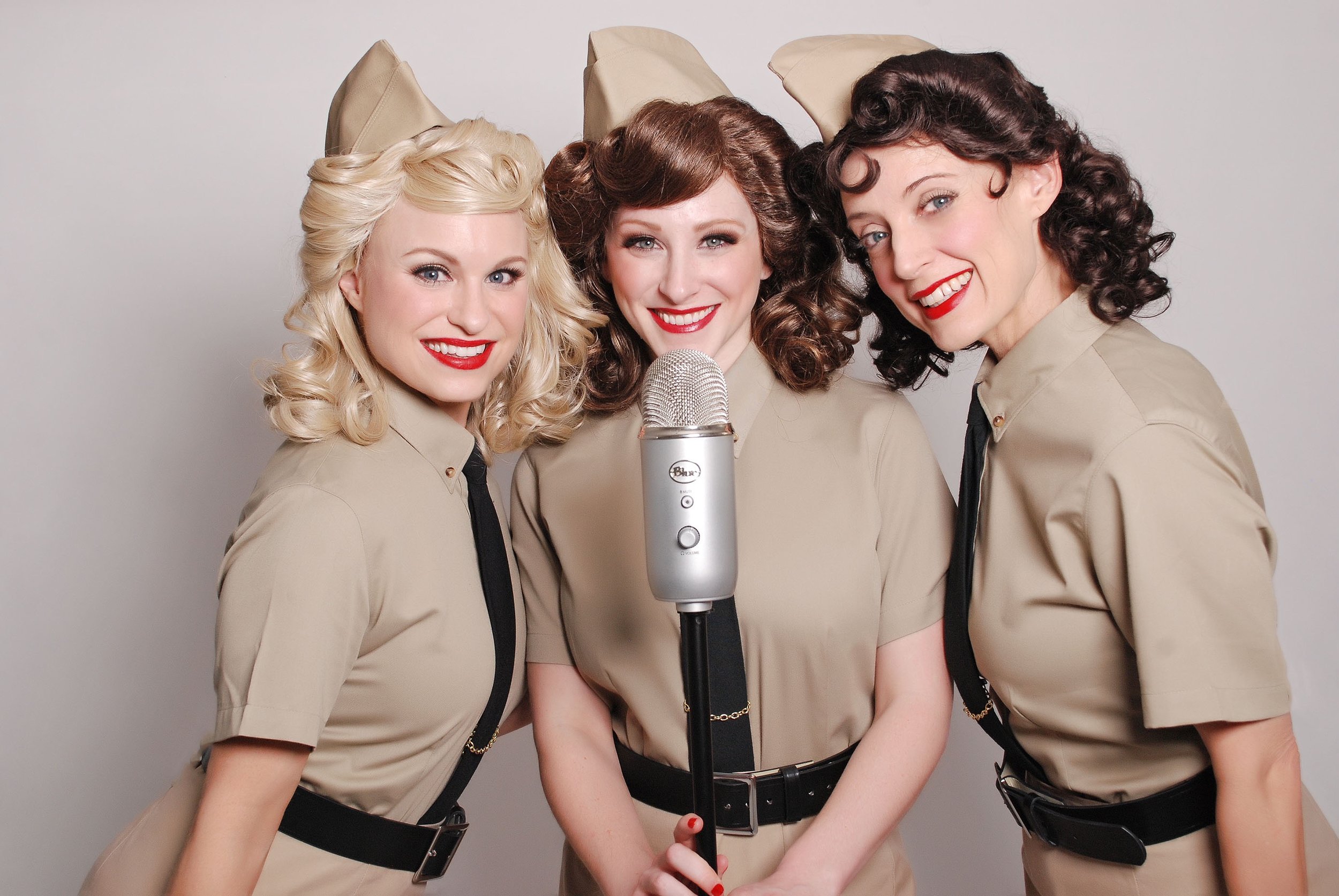 The Swing Dolls as The Andrews Sister Blue microphone