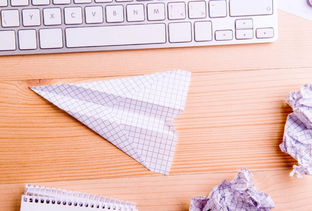 paper airplane in office.jpg