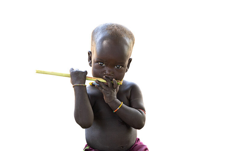 Karo tribe small child portrait from Omo Valley photo tour