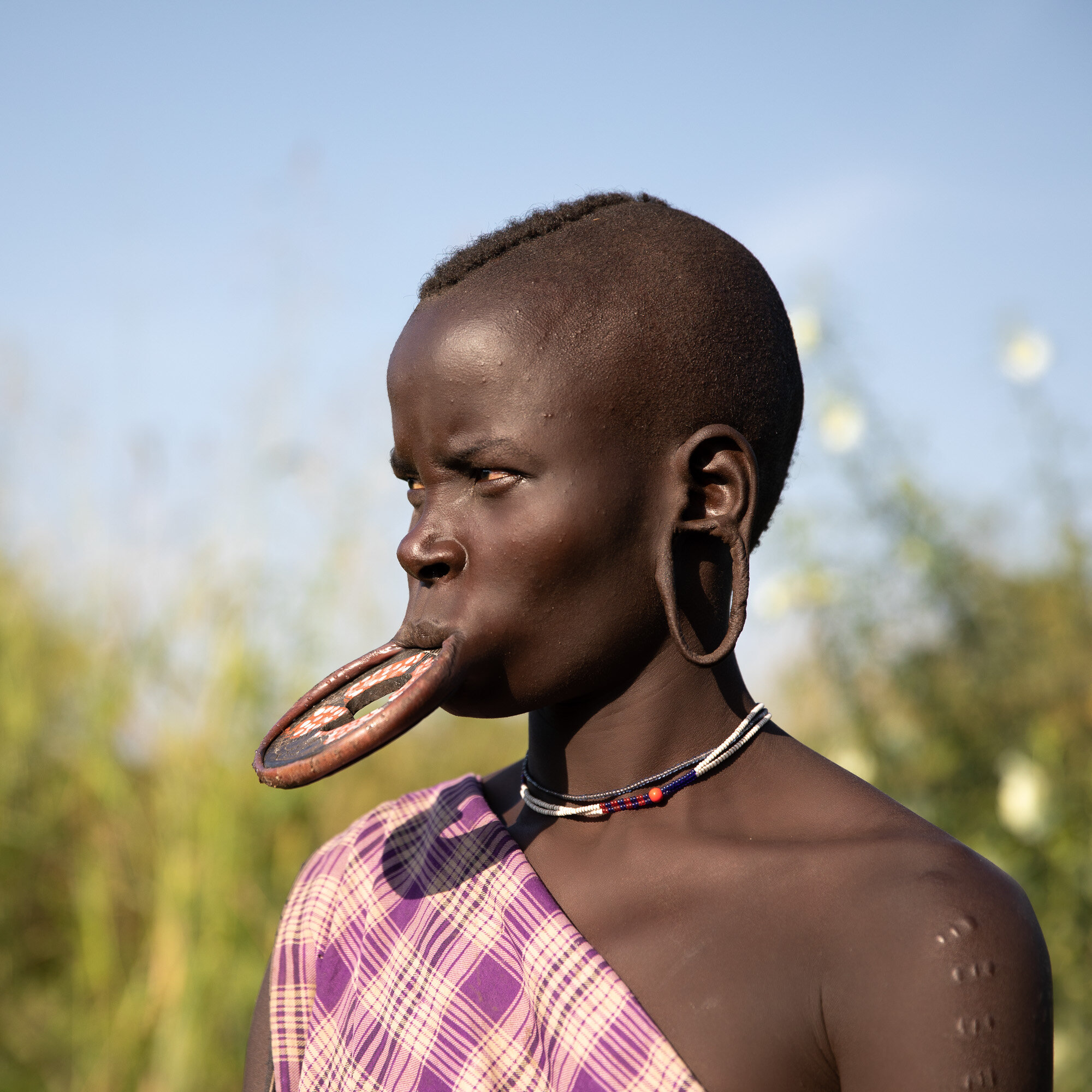 Ethiopia Mursi tribe woman with tribal lip plate