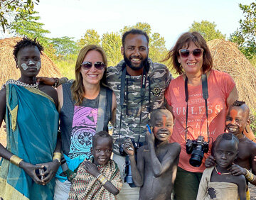 Ethiopia Omo Valley tribal photo tours group photo with Mursi Tribe