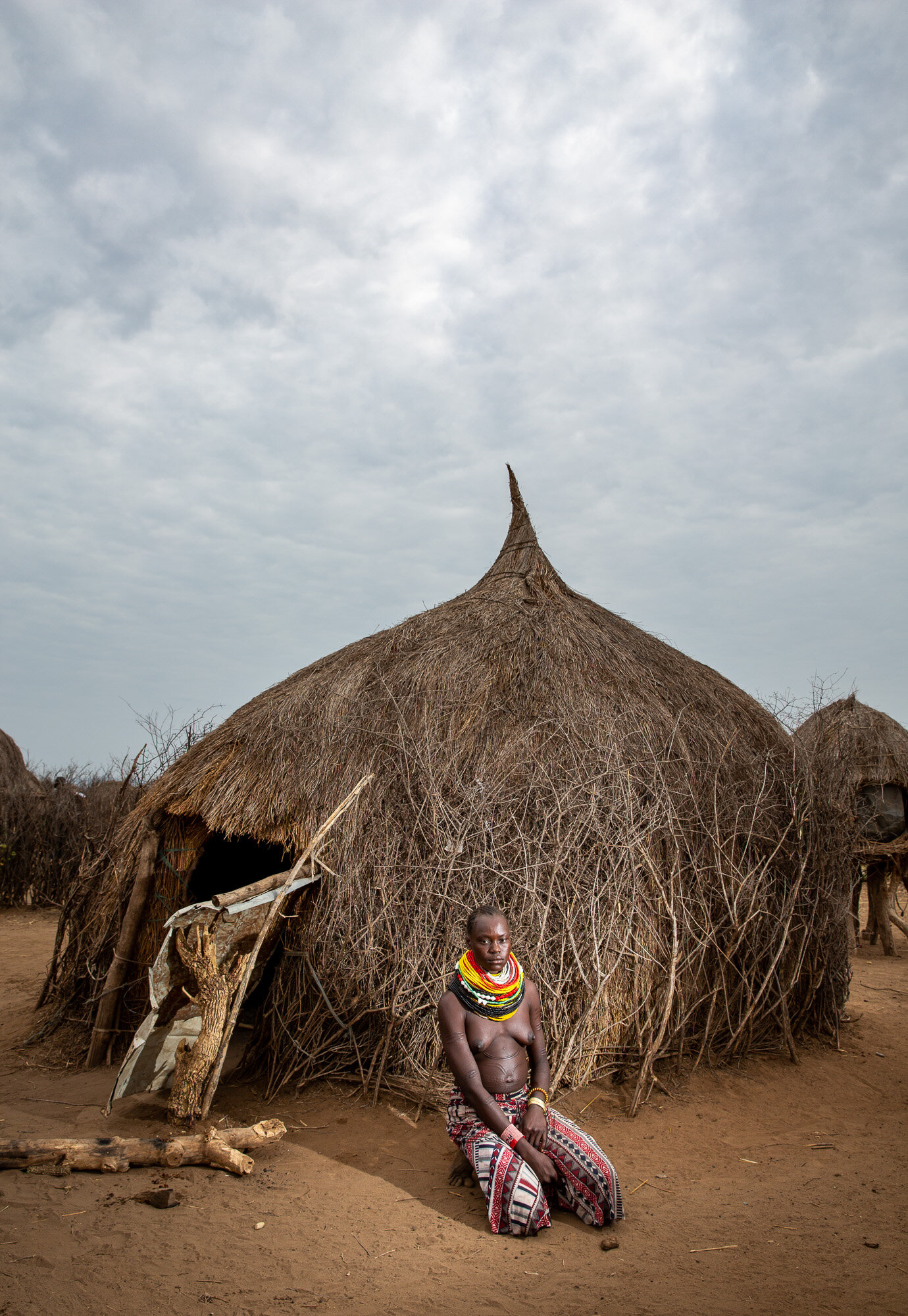 Nyangatom tribe woman body scarification Omo Valley Ethiopia