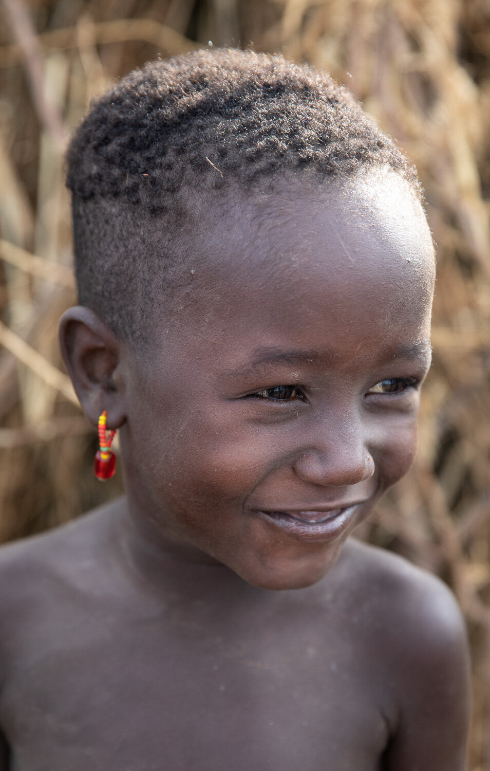 Dassanech tribe girl portrait from Ethiopia Omo Valley tribe tour
