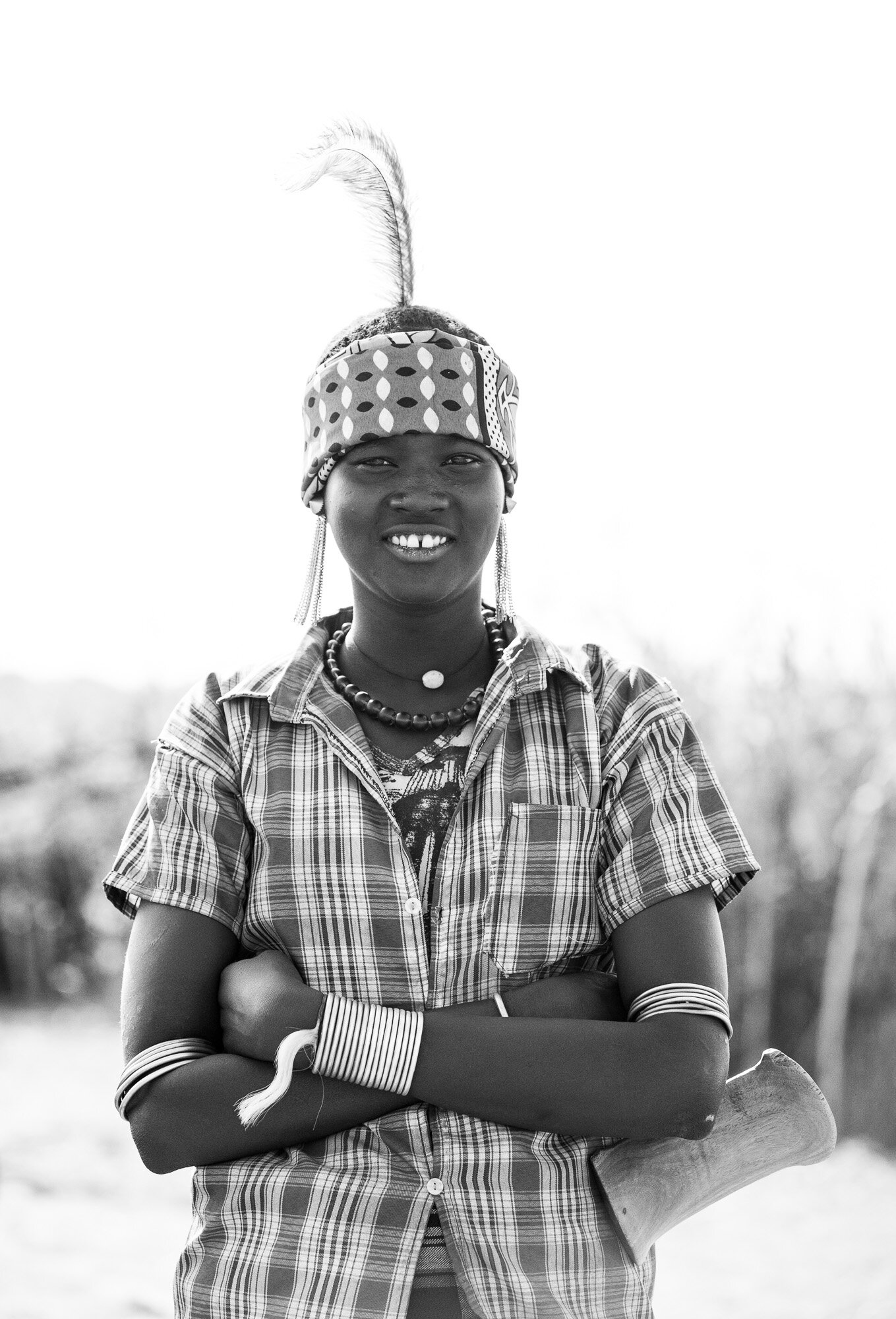 Dassanech woman portrait from Ethiopia Omo Valley tribe tour
