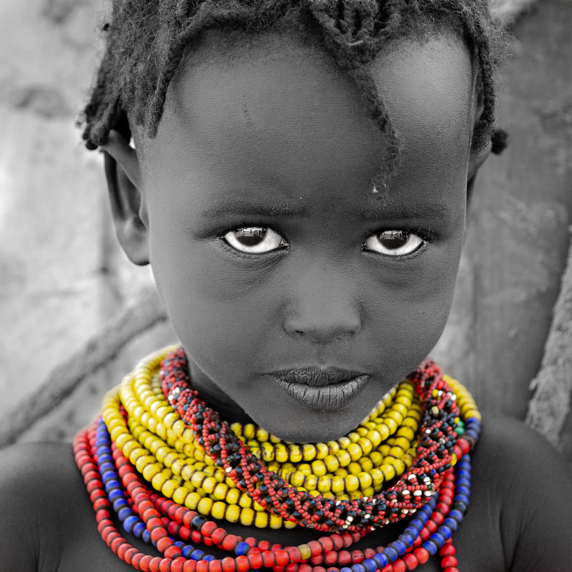 Dassanech tribe girl portrait from Ethiopia Omo Valley tribe tour