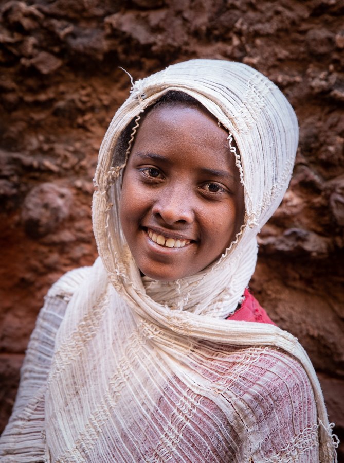 portrait in Lalibela of girl at church