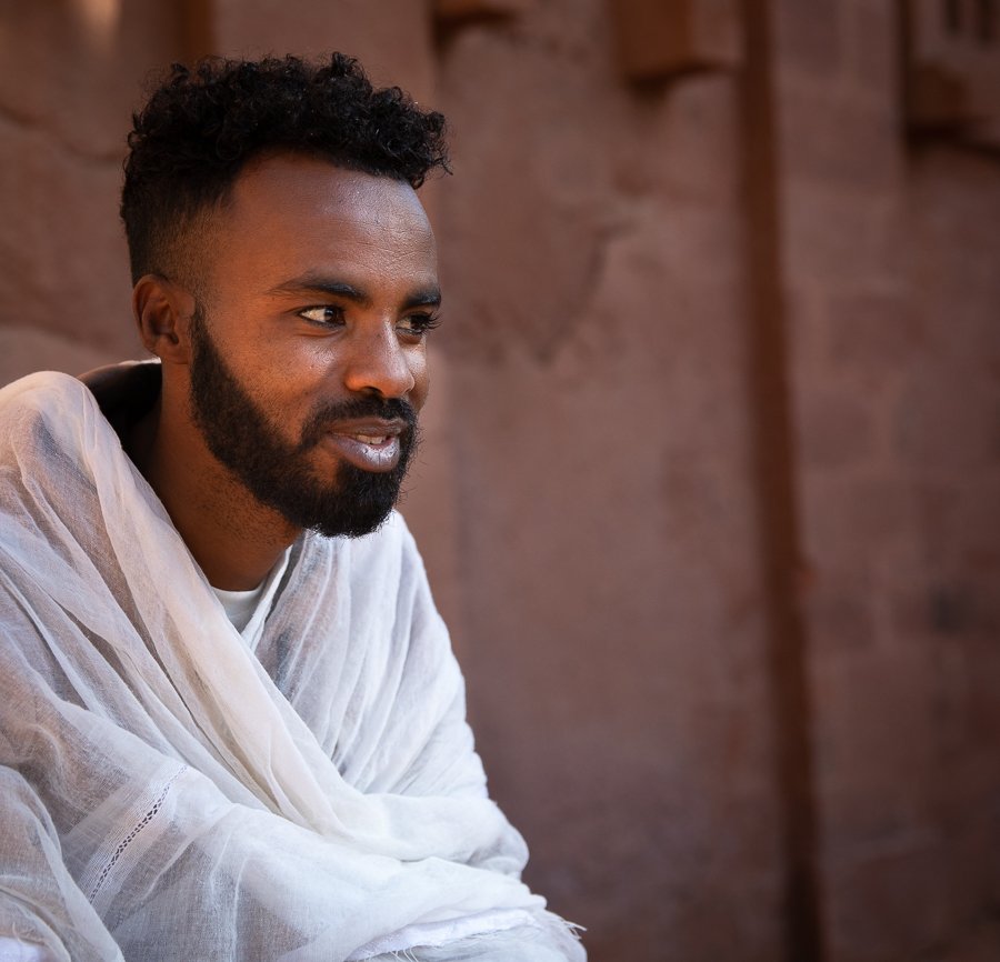 portrait of man outside church in LALIBELA Ethiopia 