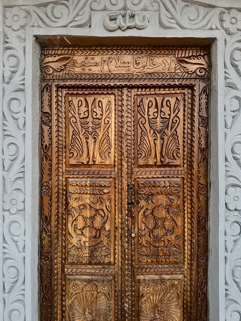 carved detail of front door of Harar house in Ethiopia