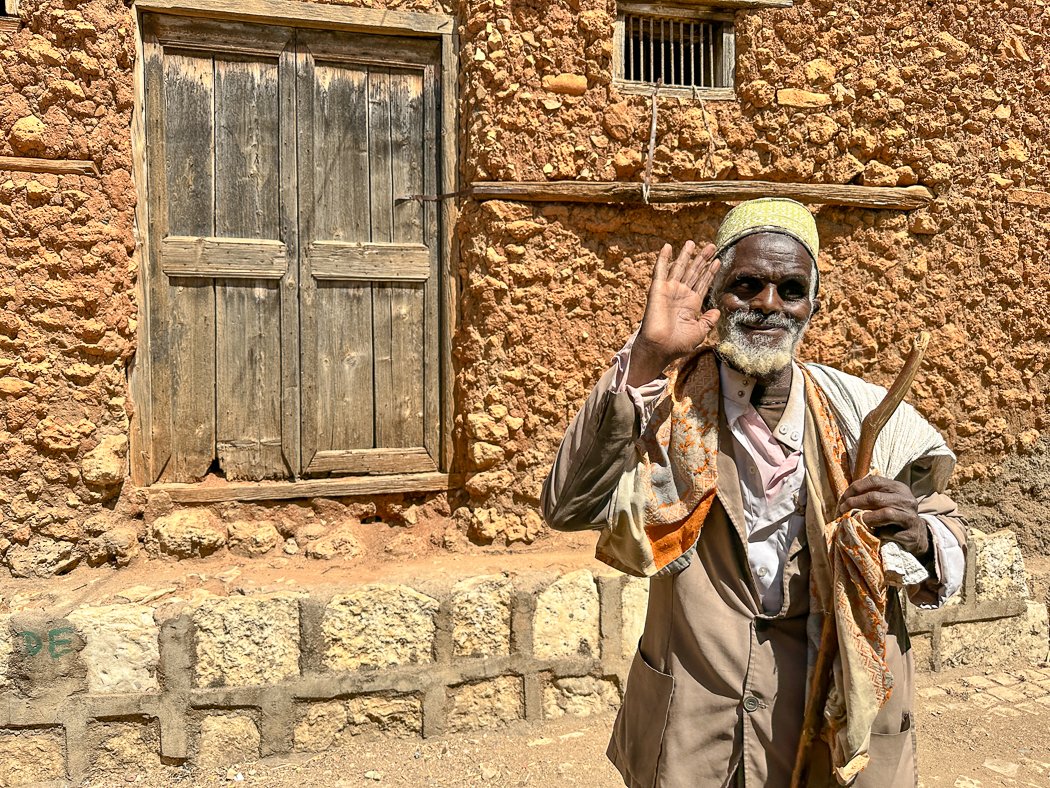 elder walking streets of harar ethiopia on photography tour with Jayne McLean