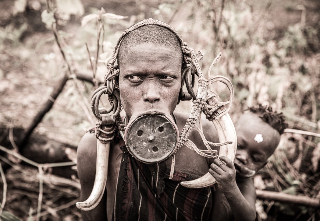 Mursi tribe women portrait with lip plate on Jayne McLean Omo Valley photo tours