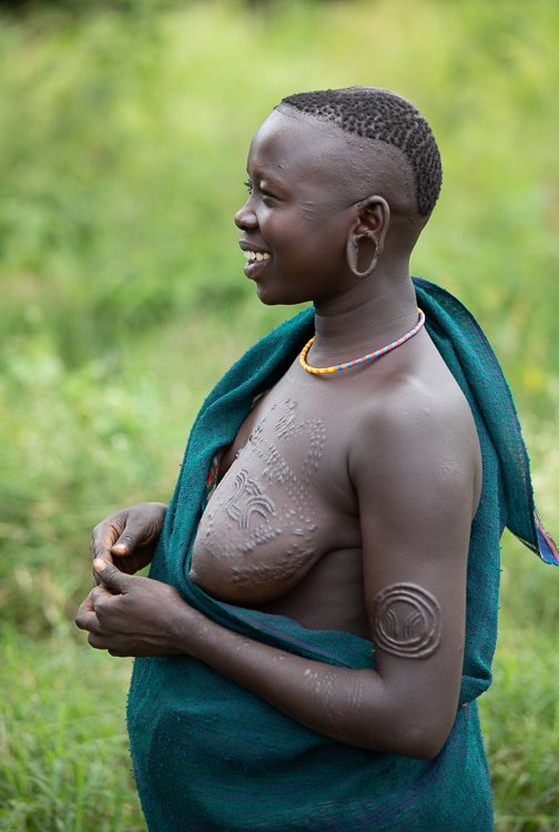African_Surma_tribe_body_scaring_portraits-1.jpg