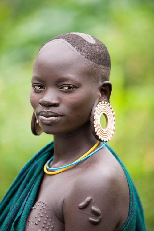 African_Surma_tribe_body_scaring_portraits-3.jpg