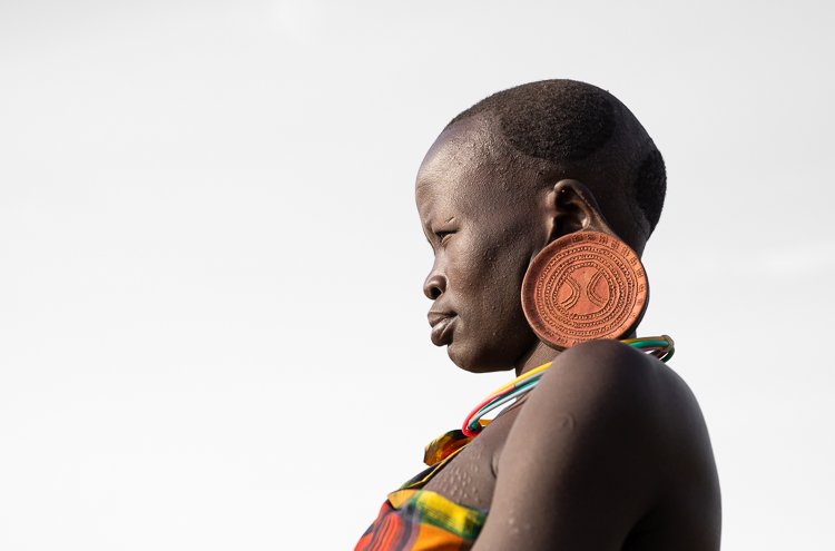 African_Surma_tribe_women_ear_plug_portraits-1.jpg