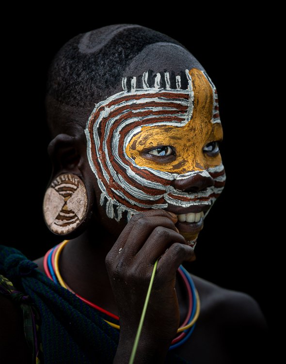 African_Surma_tribe_women_ear_plug_portraits-3.jpg