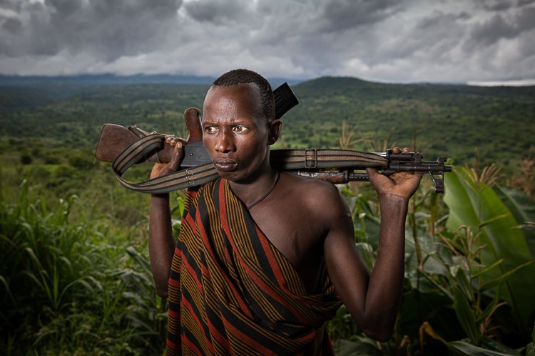 African_Suri_tribe_men_portraits-1.jpg