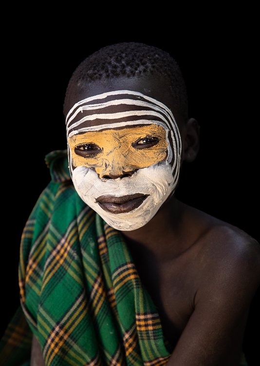African_suri_tribal_face_paint_ethiopia_photography-7.jpg