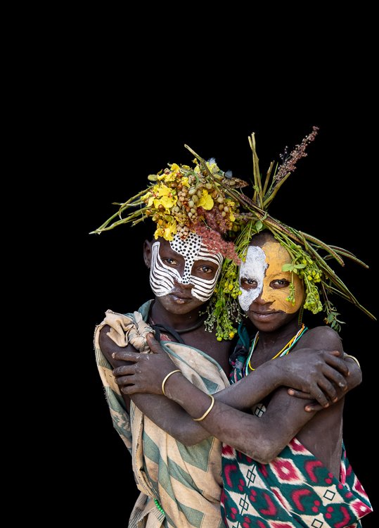 African_suri_tribe_flowers_on_head_portraits_ethiopia-3.jpg
