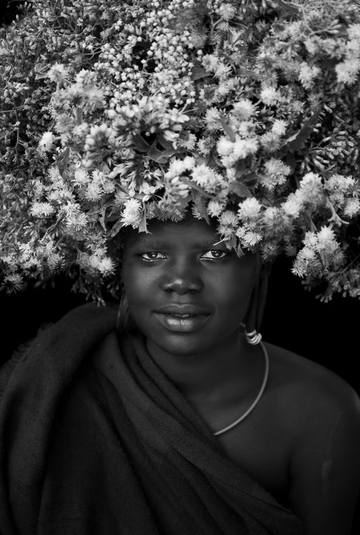 African_suri_tribe_flowers_on_head_portraits_ethiopia-9.jpg
