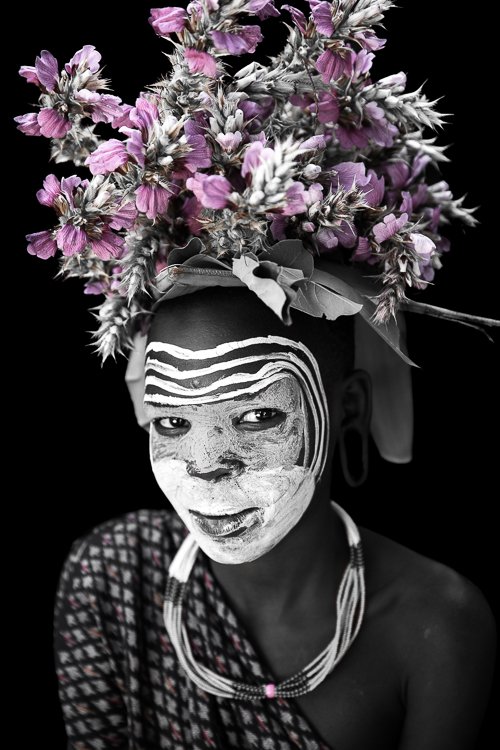 African_suri_tribe_girls_flowers_on_head-2.jpg