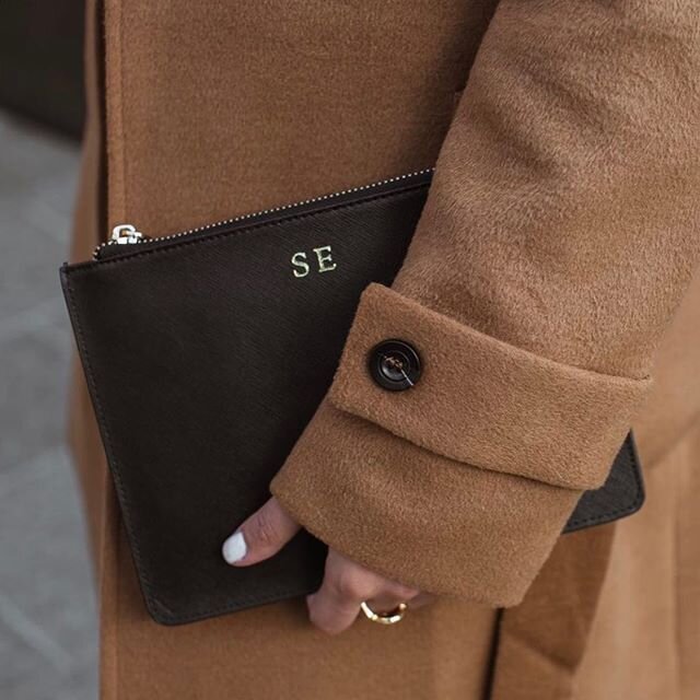 You just can beat the classic black clutch with gold monogramming 🖤🖤🖤