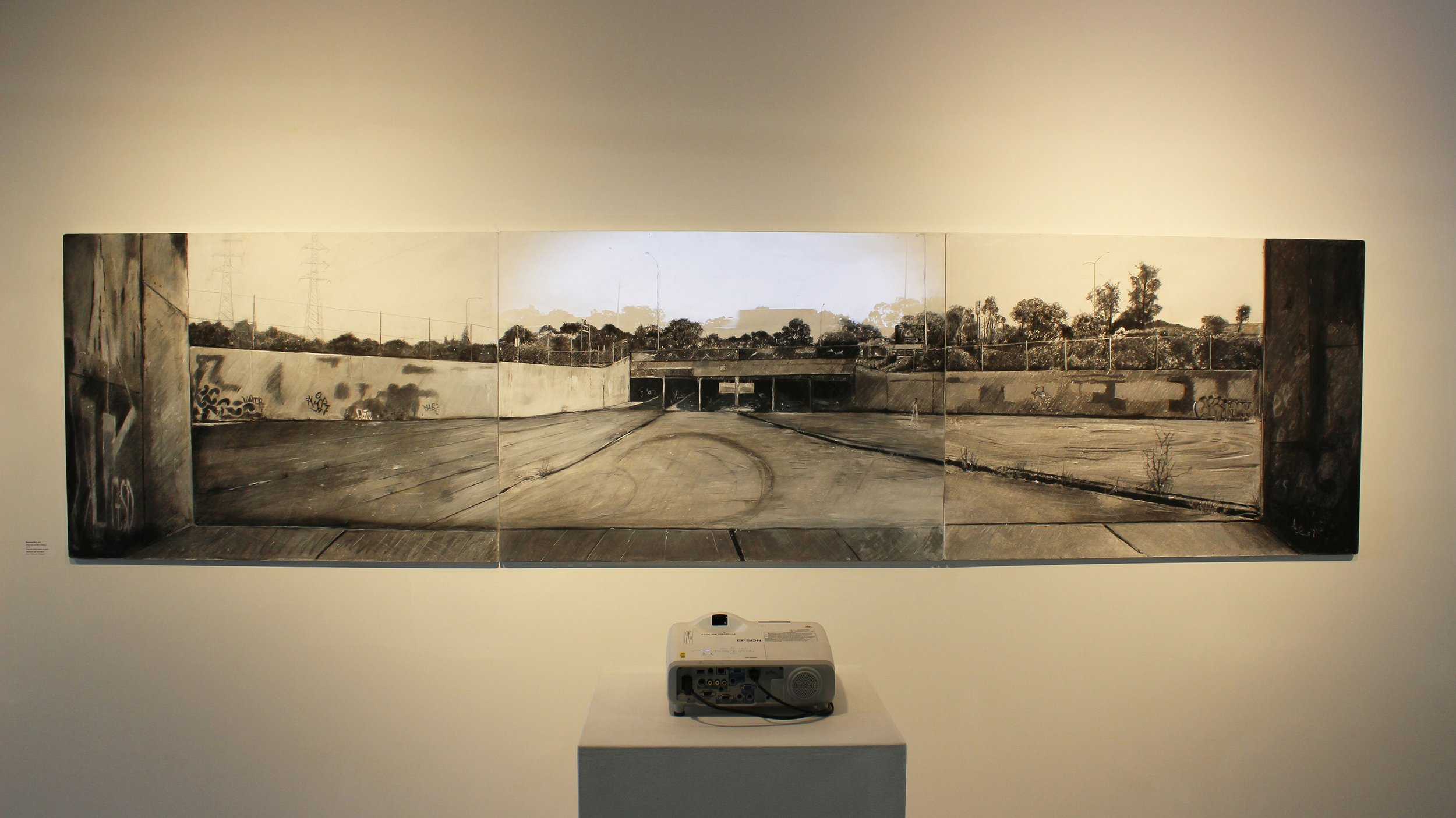 Under the southern freeway: 2019  charcoal mixed media on gesso hardboard with animation  85 x 118.5 cm x 3 pieces (triptych)