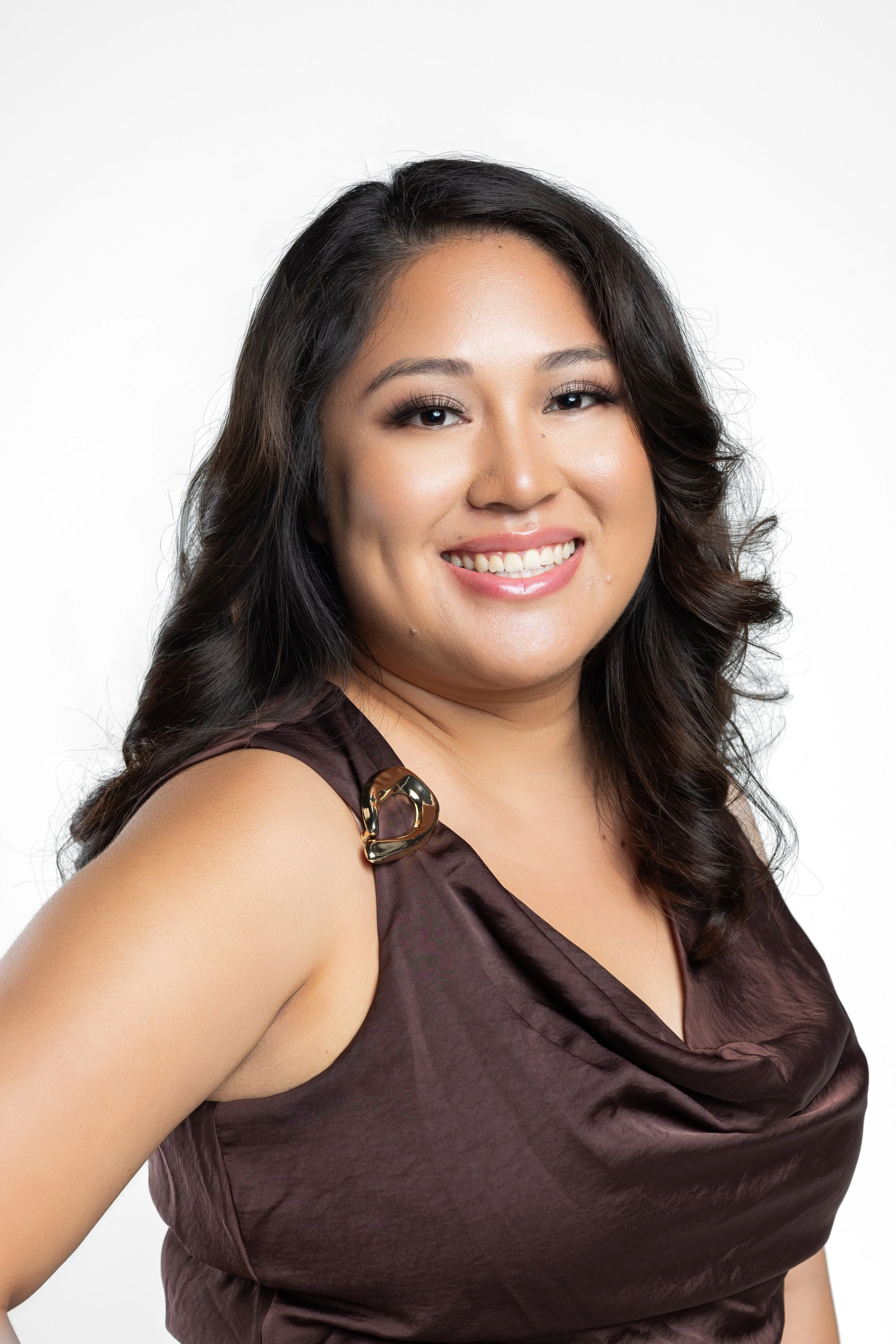 Kiara Cruz, nail artist specializing in haircuts, custom nail art, manicures, and pedicures at Cosmic Beauty in Kapolei, Hawai‘i.