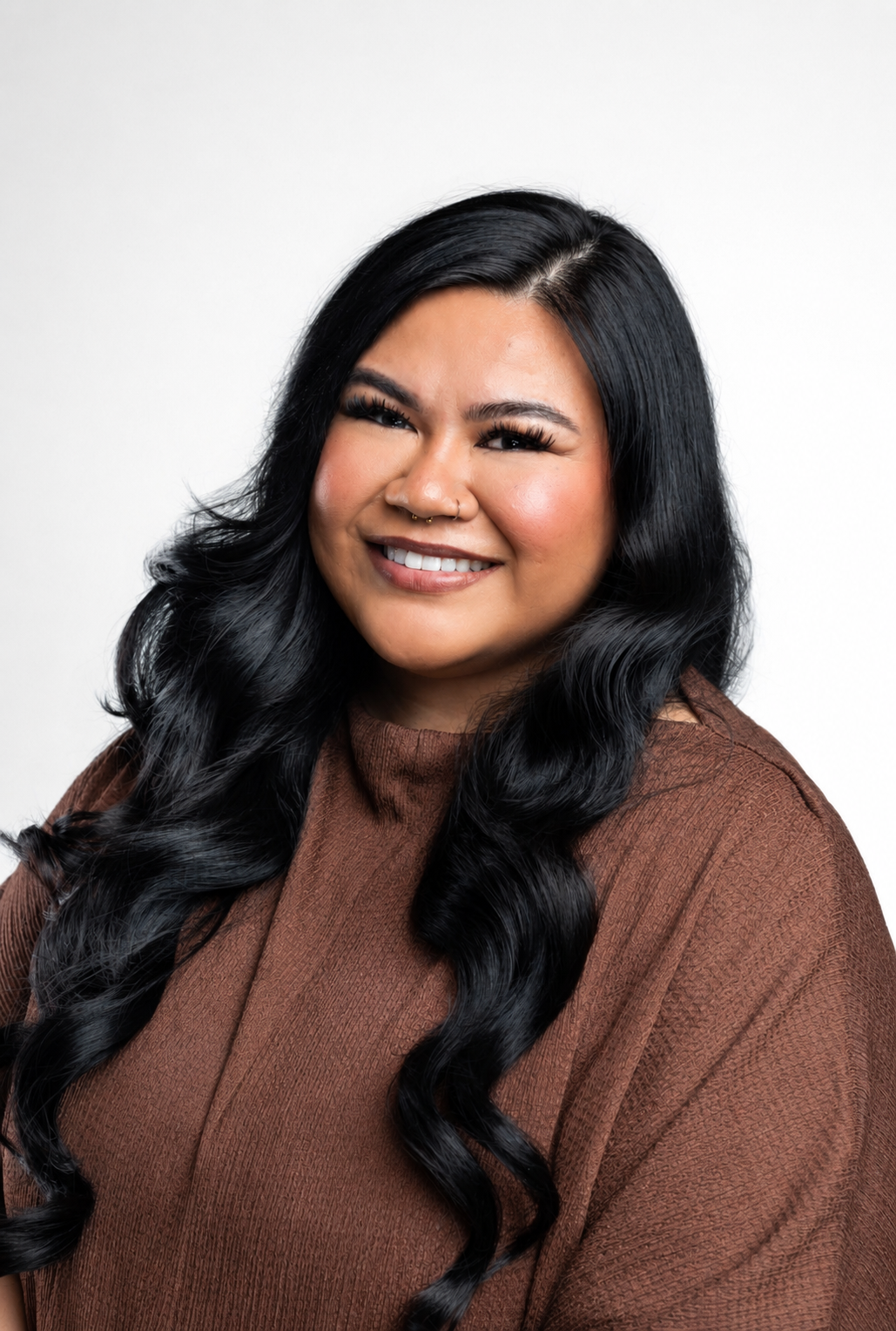 Kayli Nakoa, hairstylist specializing in blonding, hair color, haircuts, and blowouts at Cosmic Beauty in Kapolei, Hawai‘i.